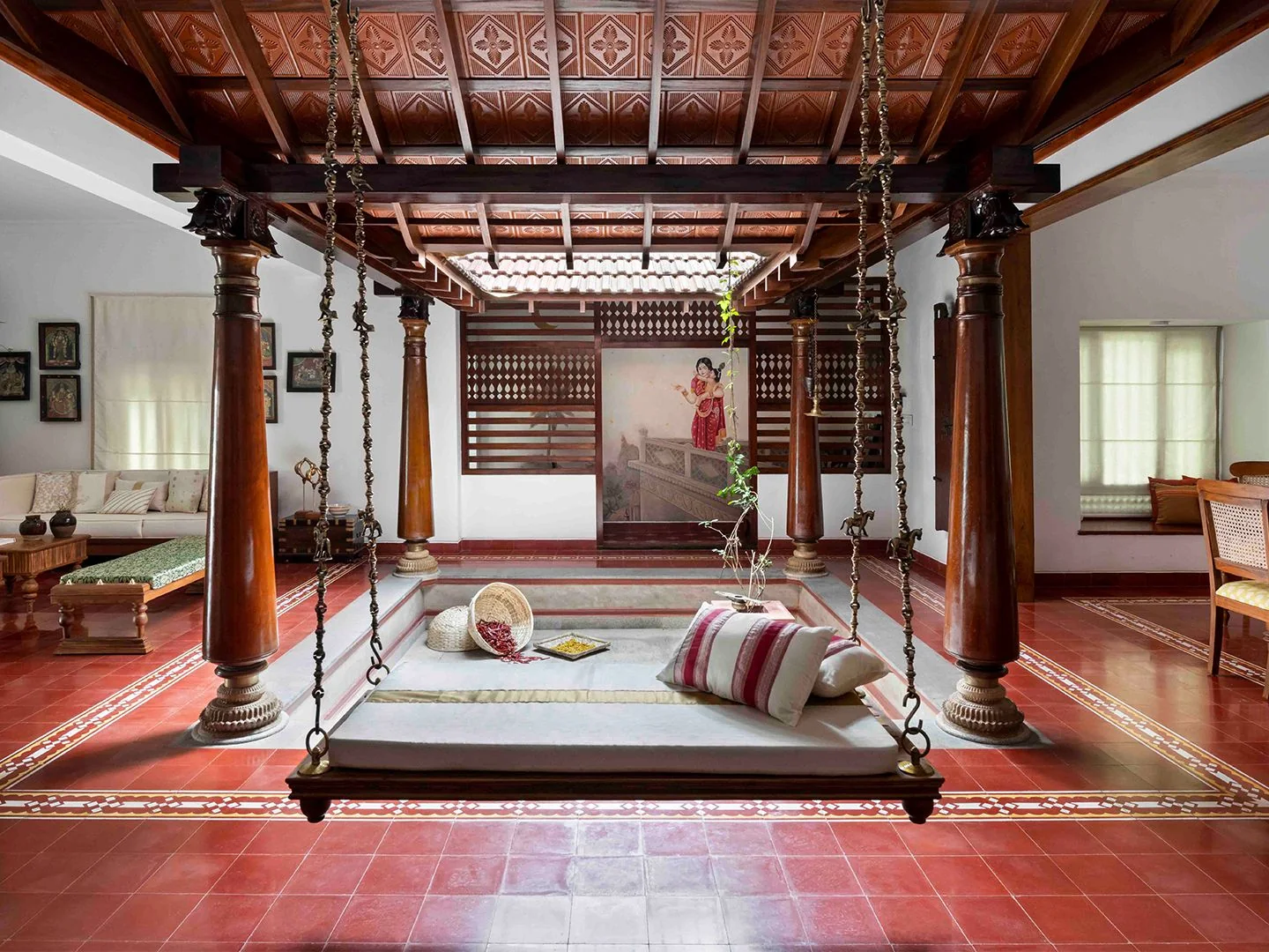 Traditional timber details and the central living space.